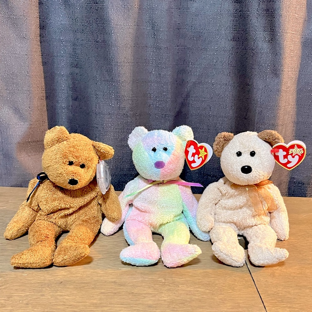 Ty Beanie Babies Fuzz (with error), Groovy, and Huggy.